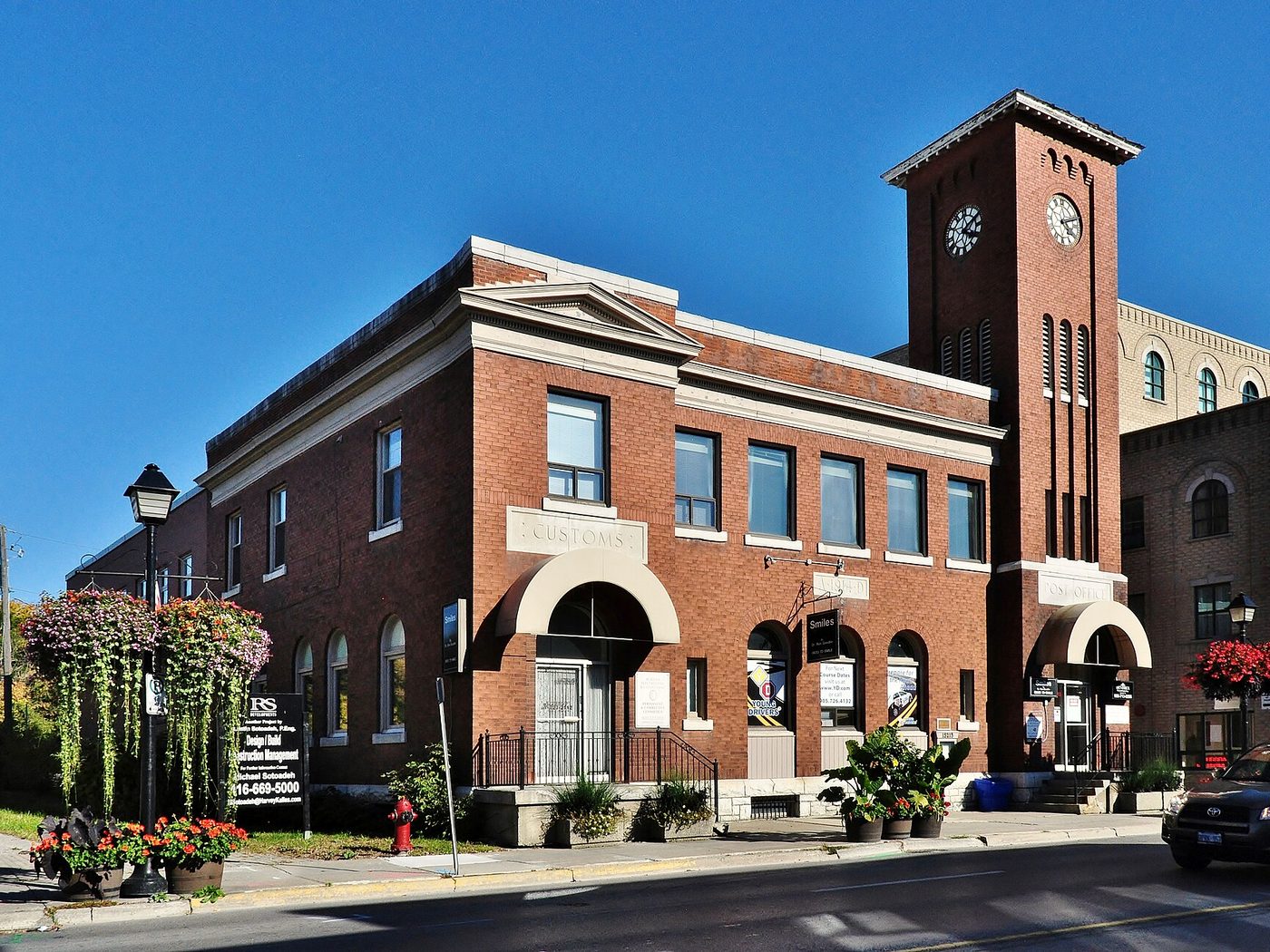 The red brick heritage post office with its clock tower on Yonge Street in downtown Aurora